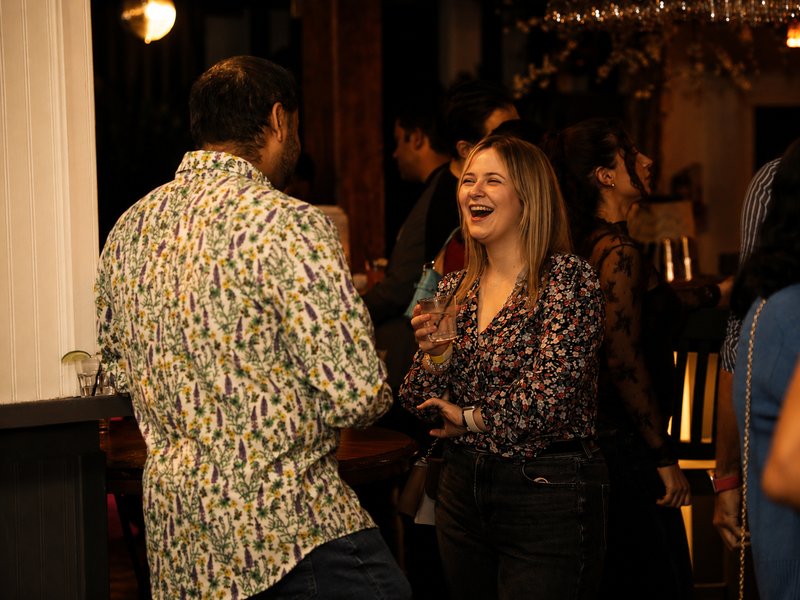 Singles laughing and connecting at a Flare Events speed dating event in Toronto