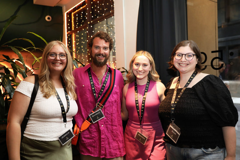 An earlier Flare Events team at a Flare event